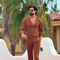 The full-length view of our Spice co-ord set, showcasing the flared trousers and the relaxed yet elegant silhouette of the V-neck shirt.