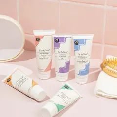 We created a realistic bathroom counter scene for this curly hair care line. The pink tiles, mirror, and brush help customers visualize the products as part of their daily routine.