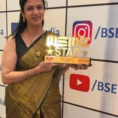 Posing with my MSME Star Award. This recognition motivates me to continue creating beautiful, handcrafted decor with all my heart.