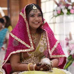 The radiant bride during her 'Paath Bithai', a pre-wedding prayer ceremony. We ensure these traditional rituals are conducted in a serene and beautiful environment, filled with blessings.