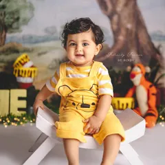 A trip to the Hundred Acre Wood for this little one's milestone session. The Winnie the Pooh theme is a timeless classic for a reason.