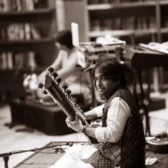 A black and white shot from our band performance, capturing a moment of intense focus. Playing with a full band requires a different kind of energy and synergy.