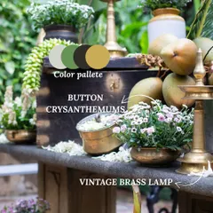 A vintage brass lamp and button chrysanthemums create a charming, rustic corner. We use elements like tender coconuts and antique pieces to add an authentic, earthy feel to our South Indian decor.