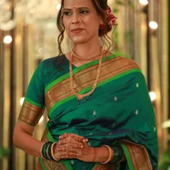The bride's aunt looking elegant and confident. It's a joy to do makeup for family members and see them shine with pride on the wedding day.