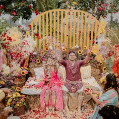 A Haldi ceremony is all about unrestrained joy. We created a vibrant, sun-drenched setting with hay bale seating and a backdrop of sunflowers, which became the perfect stage for this unforgettable flower shower, capturing the pure, unfiltered happiness of the moment.
