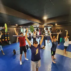 Look at this crew. We push hard, we lift heavy, but we do it together. This isn't a silent, sterile gym. This is a tribe, and we hold each other accountable.