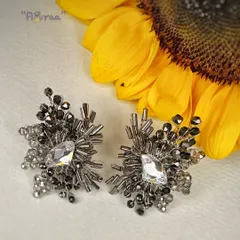 Black is always a classic. I handcrafted these shaded black earrings with metallic pipes and unique glass beads for a true masterpiece.