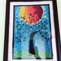 This is where it all started for me, with paper quilling. This framed tree of life is one of my early pieces, made by rolling and shaping tiny strips of paper.