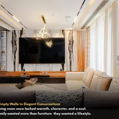 From empty walls to a space with soul. This living room design focuses on a beautiful marble feature wall that acts as a piece of art. The floating TV console and L-shaped sofa maximize floor space, making the room feel open and elegant.