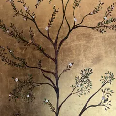 A full view of the hand-painted tree on the shimmering gold leaf background. I designed the branches to feel both delicate and expansive, filling the vertical space of the wall panel.