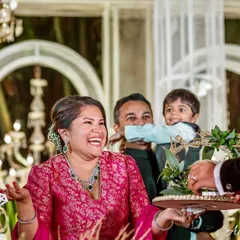 A funny, candid moment during the ring ceremony. The groom's sister playfully asks "Where is the ring?", creating a memorable story.