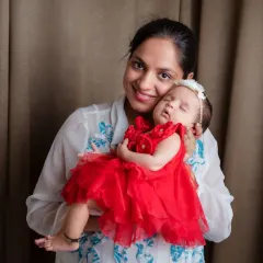 A mother's love is a reflection of strength and sparkle. We love capturing these tender moments between mom and baby.