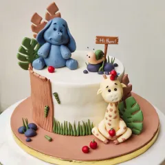 This sweet and whimsical cake features cute, handmade fondant animals like an elephant and a giraffe. It's a great example of a custom-designed cake that tells a story and brings joy to a special celebration.