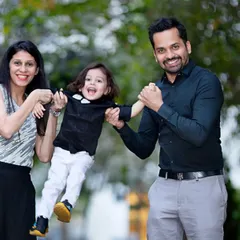 Love and laughter captured in a single frame. These playful, interactive shots often become the most cherished family portraits.