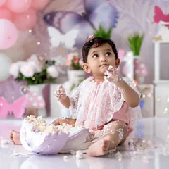 Let them smash cake! A first birthday is a huge milestone, and I believe in celebrating it with all the fun and mess. This butterfly-themed cake smash is pure, sweet joy.
