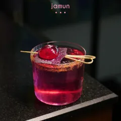 The Jamun cocktail is summer in a glass. We capture the vibrant, tangy flavor of the Indian blackberry in this striking purple drink, balanced for a punchy and refreshing sip that evokes seasonal nostalgia.