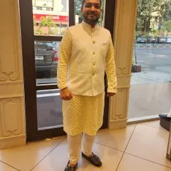This elegant kurta and jacket set is perfect for a daytime wedding event or a festive celebration like Diwali. I have a diverse wardrobe of ethnic wear for any occasion.