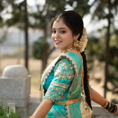 A view of a long, traditional bridal braid. This hairstyle is a classic for South Indian weddings and looks stunning with a Kanjivaram saree.