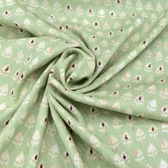 As soft as a cloud, this printed mul mul cotton in a pastel green shade is made for sunlit days. Its lightweight and breathable nature makes it ideal for kurtas and dresses.