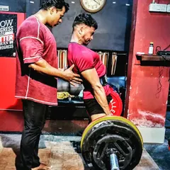 Deadlift is the ultimate test of strength. I focus on every detail of the form, from the setup to the lockout. This hands-on correction is what prevents injury and builds real power.