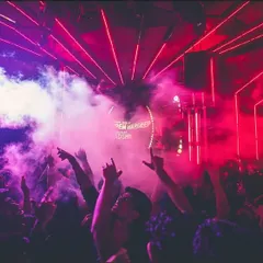 The Christmas party at Flo Church Street was lit. The combination of red lasers, smoke, and a crowd with their hands in the air created a festive and high-energy atmosphere.