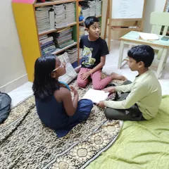 I believe confidence grows in a supportive circle. Our public speaking workshops are a safe space for children to practice expressing their ideas, collaborate on stories, and find their voice among friends. It's amazing to watch shy kids blossom into confident speakers.