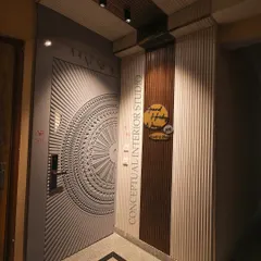 This entrance sets a modern, minimalist tone for the entire 3BHK. The intricately designed main door is a work of art in itself.