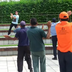 Leading a Zumba fitness program for a corporate client. It's a great way to bring energy and wellness into the workplace.