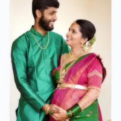 A classic portrait of an expecting couple during their traditional South Indian baby shower. We focus on capturing the joy and connection between the couple, highlighting their beautiful attire and the significance of the day.