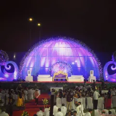 For a truly grand celebration, we can build massive, custom stage structures like this illuminated dome. This shows our capability in handling large-scale outdoor wedding receptions and sangeets.