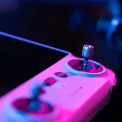 A stylized close-up of the DJI controller joystick, representing the precision and control we bring to every flight.
