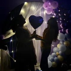 A creative silhouette shot of two friends against the backdrop of our fairy light curtain. The lighting in the theatre is perfect for these kinds of photos.