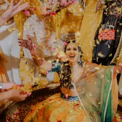 Being showered with love and petals! I love capturing the bride's expression of pure delight during her Haldi ceremony.
