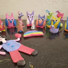 A flock of colourful clay owls made by my students. Each one has its own funny personality.