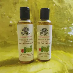 Our Hibiscus & Amla Hair Oil is a cornerstone of our hair care line. It is formulated to address hair loss and promote stronger, healthier hair using traditional Ayurvedic ingredients.