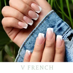 For a sharper, more modern look, I create a V-French manicure. The angled white tips give the nails a bold, geometric appearance that elongates the fingers.