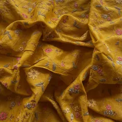 The rich texture of this mustard embroidered slub silk makes it a festive favorite. The detailed floral embroidery adds a touch of grace, ideal for kurtas, suits, and even sarees.