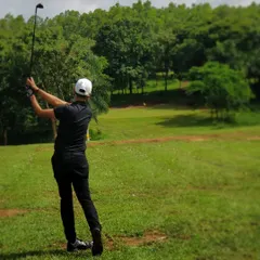 Holding the finish is a great habit that shows commitment to the shot. This pose reflects the culmination of a well executed swing, a goal we strive for in every lesson.