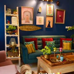 Here is my cutest little model posing in front of our gallery wall. I love mixing different art styles and objects to create a wall that tells a story and reflects our passions.