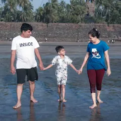 Family lifestyle photography is all about connection. A simple walk on a Mumbai beach, holding hands, creates a timeless memory that feels natural and full of love.