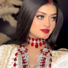 A portrait from my Aishwarya Rai Cannes look recreation. The focus is on the flawless skin, bold red lip, and the striking red sindoor line.
