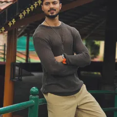 The same casual look, but with a direct and engaging smile. It's important to show a range of expressions.