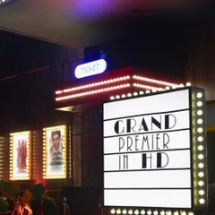 The details make the theme. For this Bollywood premiere Sangeet, we created a ticket booth and custom movie posters featuring the couple, making the entrance an immersive experience for guests from the moment they arrived.