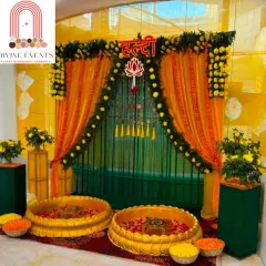 A Haldi ceremony should be full of joy and light. Here, I used a classic combination of marigold flowers and bright yellow and green drapes to create a traditional and cheerful setting. The setup is designed to be perfect for photos while being functional for the ceremony's rituals.