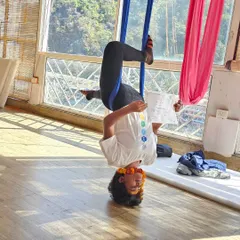 When I was struggling to walk, I decided to learn to fly. Here I am, a certified Aerial Yoga Instructor. This practice is incredible for decompression, building core strength, and improving flexibility.