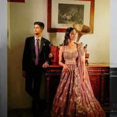 A stylish couple portrait taken during the Sangeet. We create designated photo corners with vintage props and beautiful lighting for those perfect, magazine-worthy shots.