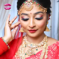 A close-up of a gorgeous South Indian bridal look. The portfolio shoot helps students capture high-quality images of their work, focusing on details like eye makeup and jewelry placement.