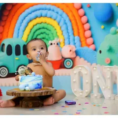A first birthday cake smash is a memory to treasure forever. We create vibrant, fun-filled setups with colorful backdrops and delicious cakes to celebrate this special milestone.