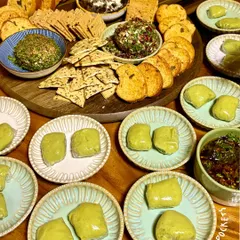 For hosts who want to impress, these are my go-to gourmet party starters. The platter includes my signature cheese domes, like cranberry jalapeño and truffle mushroom, served with a variety of crackers. Alongside are my creamy truffle edamame pockets, paired with a sweet and spicy chilli cashew onion jam.