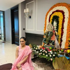 A moment of peace during Ganpati celebrations. This simple yet elegant pink suit felt just right for the occasion, allowing for comfort while sitting for the puja.